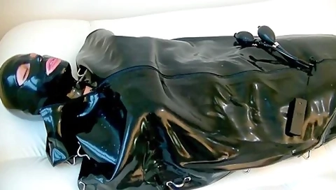 Girl Punished In Rubber Sleepsack